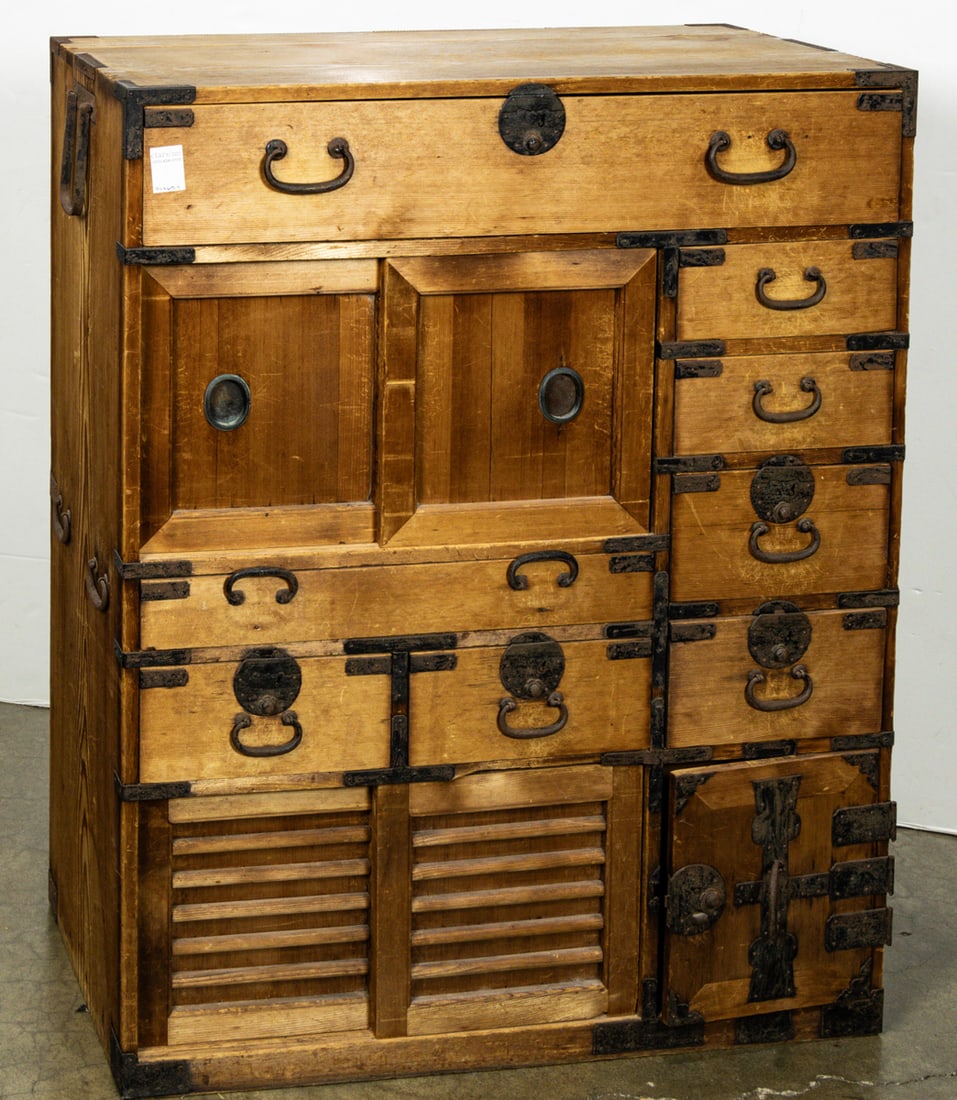 A Japanese tansu: A Japanese tansu. Early 20th century, 40.75"h x 32.5"w x 15.5"d.