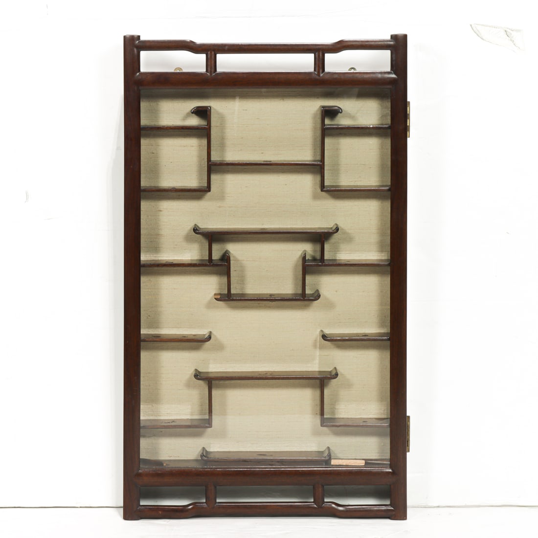 A Chinese hardwood hanging curio cabinet designed by Charlotte Horstmann (1 of 1)