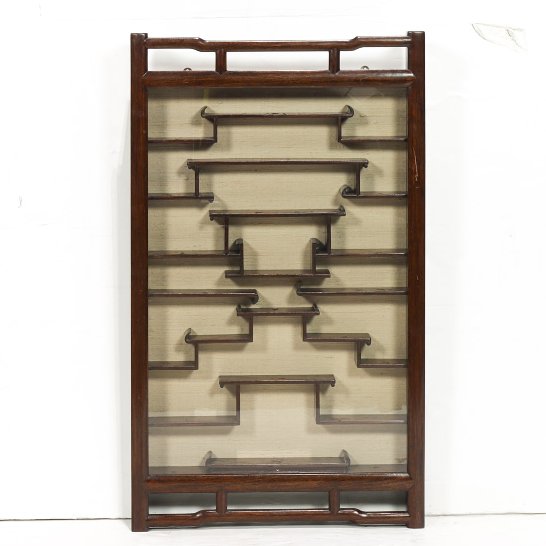 A Chinese hardwood hanging curio cabinet designed by Charlotte Horstmann (1 of 1)