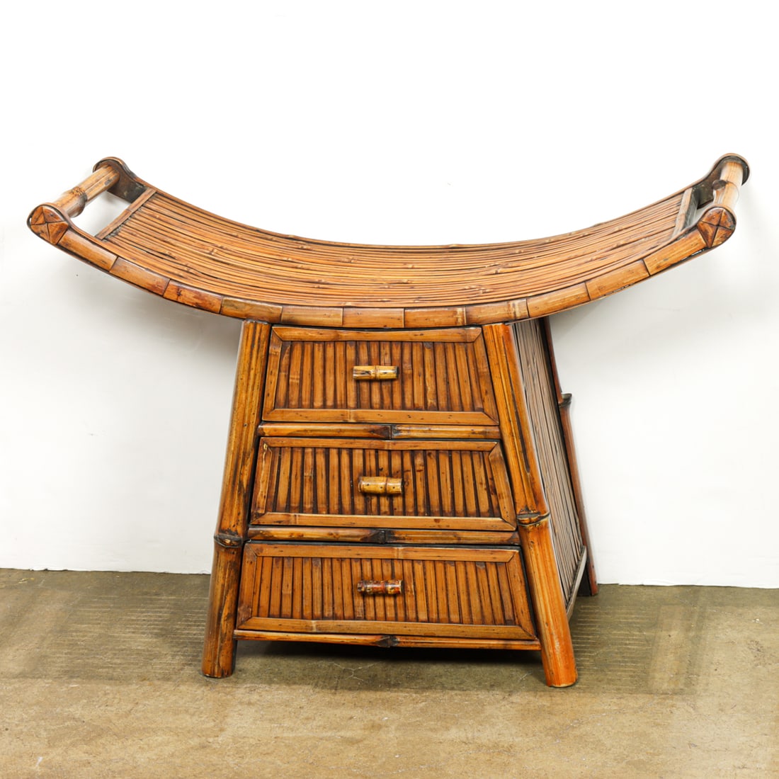 A klismos style bamboo stool with drawers: A klismos style bamboo stool with drawers. 20th century, 20.5"h x 29"w x 11.25"d.