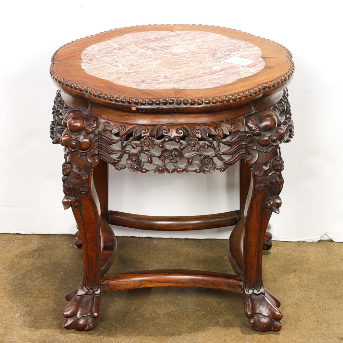 A Chinese hexagonal rosewood marble top stand (1 of 1)