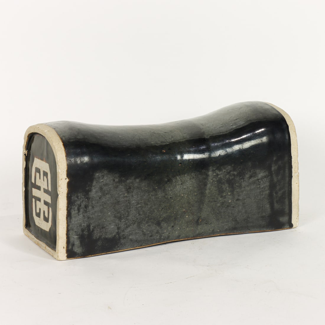 A Chinese brown glazed headrest (1 of 1)