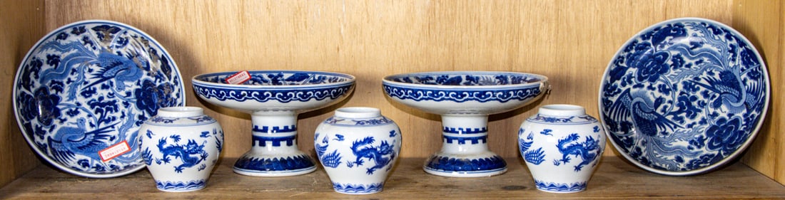 A group of Chinese blue and white 'phoenix' stem bowls and jars: A group of Chinese blue and white 'phoenix' stem bowls and jars. 20th century, 7.75" widest.