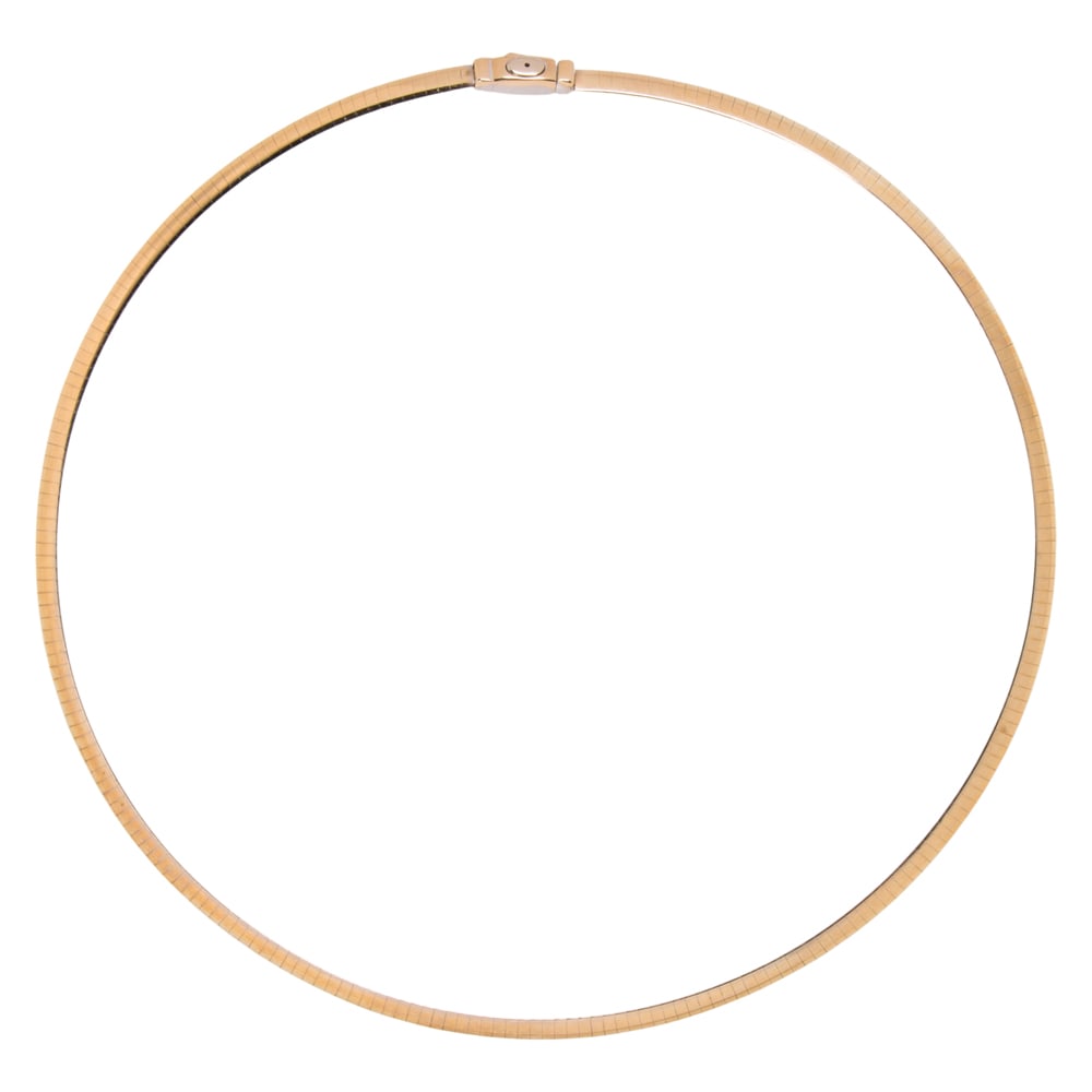 A 14k bi-color gold omega necklace: A 14k bi-color gold omega necklace reversible yellow to white gold sides; length: 16 in; 18.40 grams