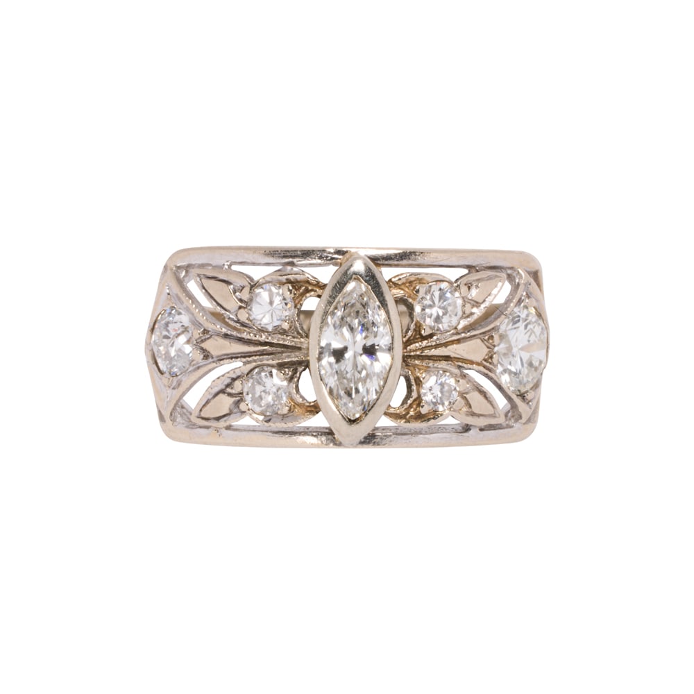 A diamond and 14k white gold ring: A diamond and 14k white gold ring The rectangular top set with marquise, transitional, round brilliant, and European-cut diamonds; estimated total diamond weight: 1.05 carats; size 7; 3.50 grams