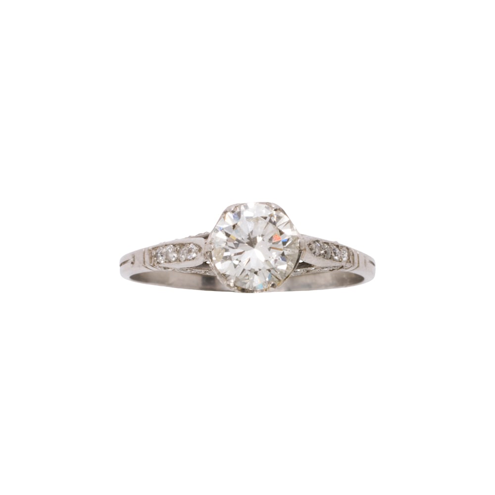 A diamond and 14k white gold solitaire ring (1 of 2)