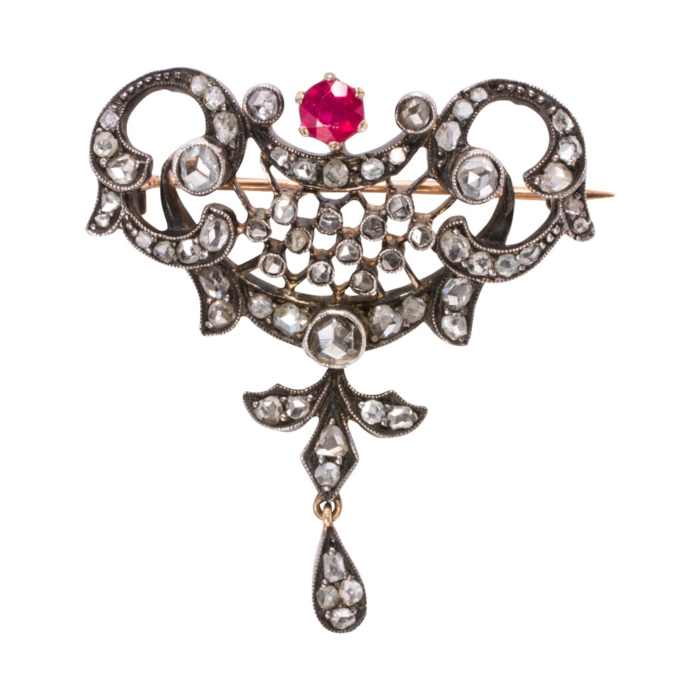 A diamond, ruby, and blackened silver topped 18k gold brooch (1 of 1)