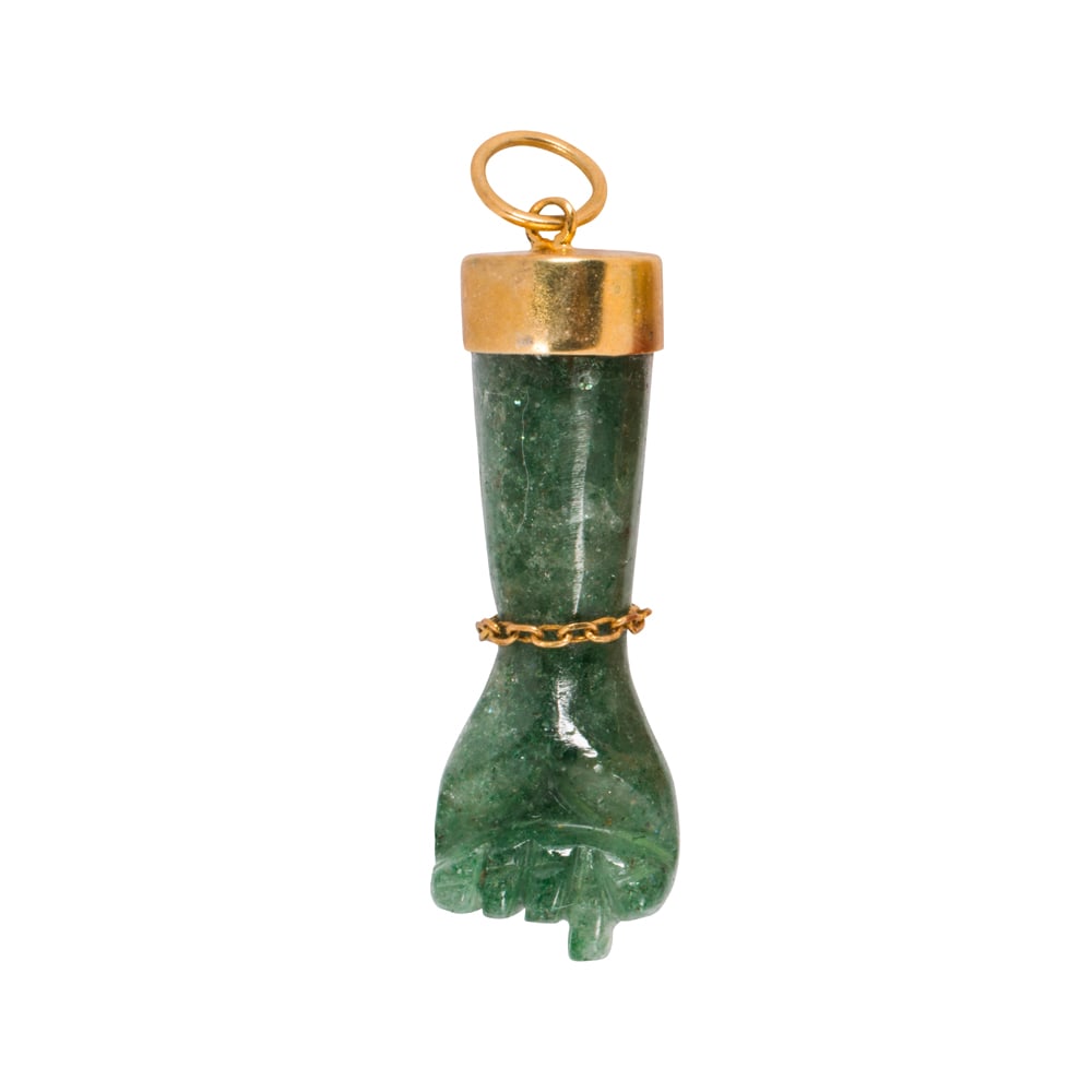 A hardstone and 18k gold figa pendant: A hardstone and 18k gold figa pendant Of figa design, set in 18k gold; length: 1 1/2 in; 6.80 grams