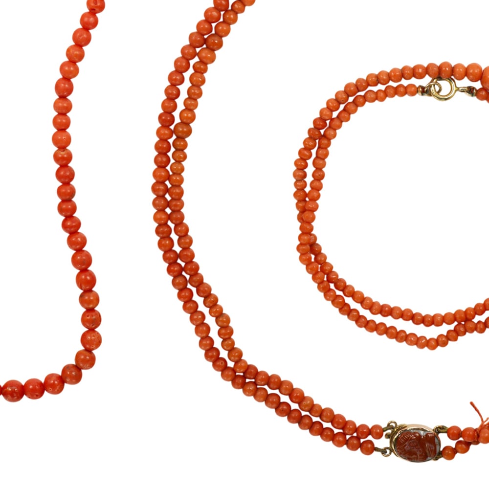 Four coral necklaces: Four coral necklaces Comprising four coral necklaces set with round-shaped coral beads of varying sizes; gross weight: 78.20 grams