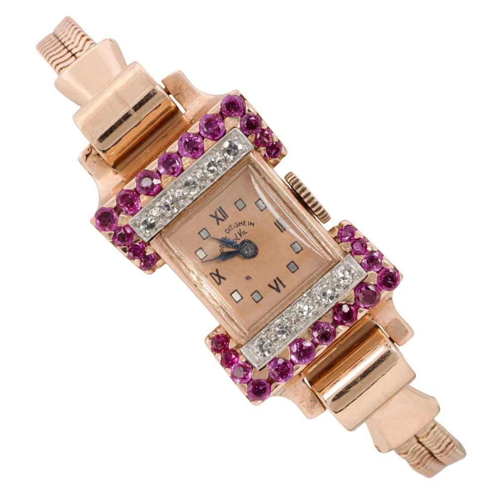 A Retro Paul Ditisheim Solvil diamond, ruby and 14k rose gold watch: A Retro Paul Ditisheim Solvil diamond, ruby and 14k rose gold watch Case no.: 00417BThe copper-tone face, multi-color mixed indices, black dauphine hands, within diamond and ruby-set 14k rose gold cas