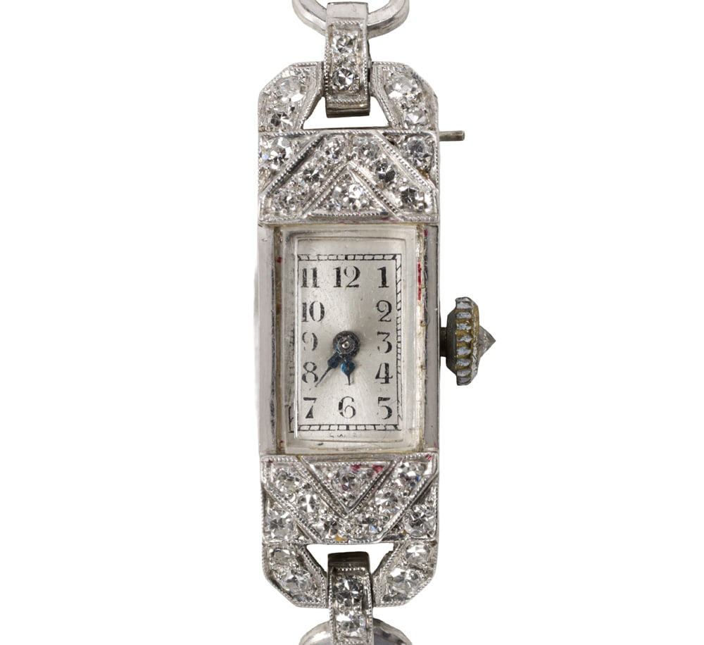 An antique diamond, platinum, and gold-filled watch (1 of 2)