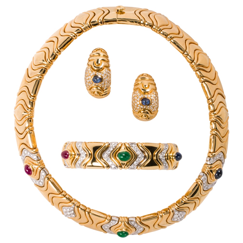 A diamond, gem-set and 18k gold suite (1 of 2)