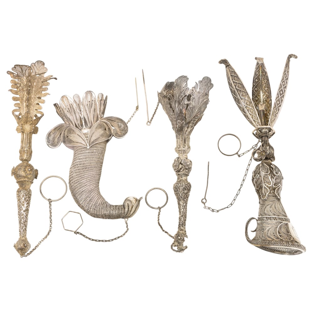 Four Chinese and English silver filigree posy holders or tussie mussies: Four Chinese and English silver filigree posy holders or tussie mussies, circa 1860-1890, comprising two Chinese each with leaf cup; one English with D monogram on tripod and one English cornucopia