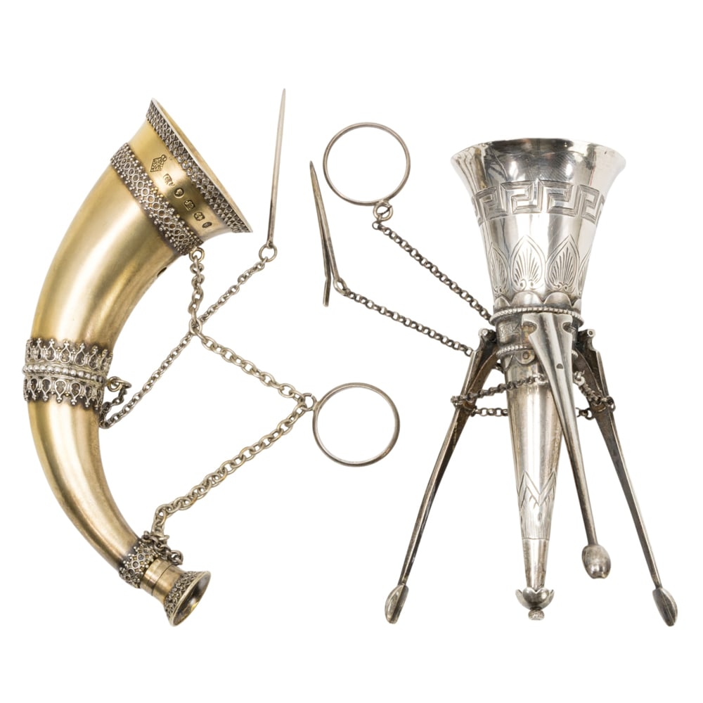 Two English silver posy holders or tussie mussies: Two English silver posy holders or tussie mussies, circa 1860-1870, the first English silver tripod with Greek key and anthemion bands; the second Birmingham sterling of horn form with removable top
