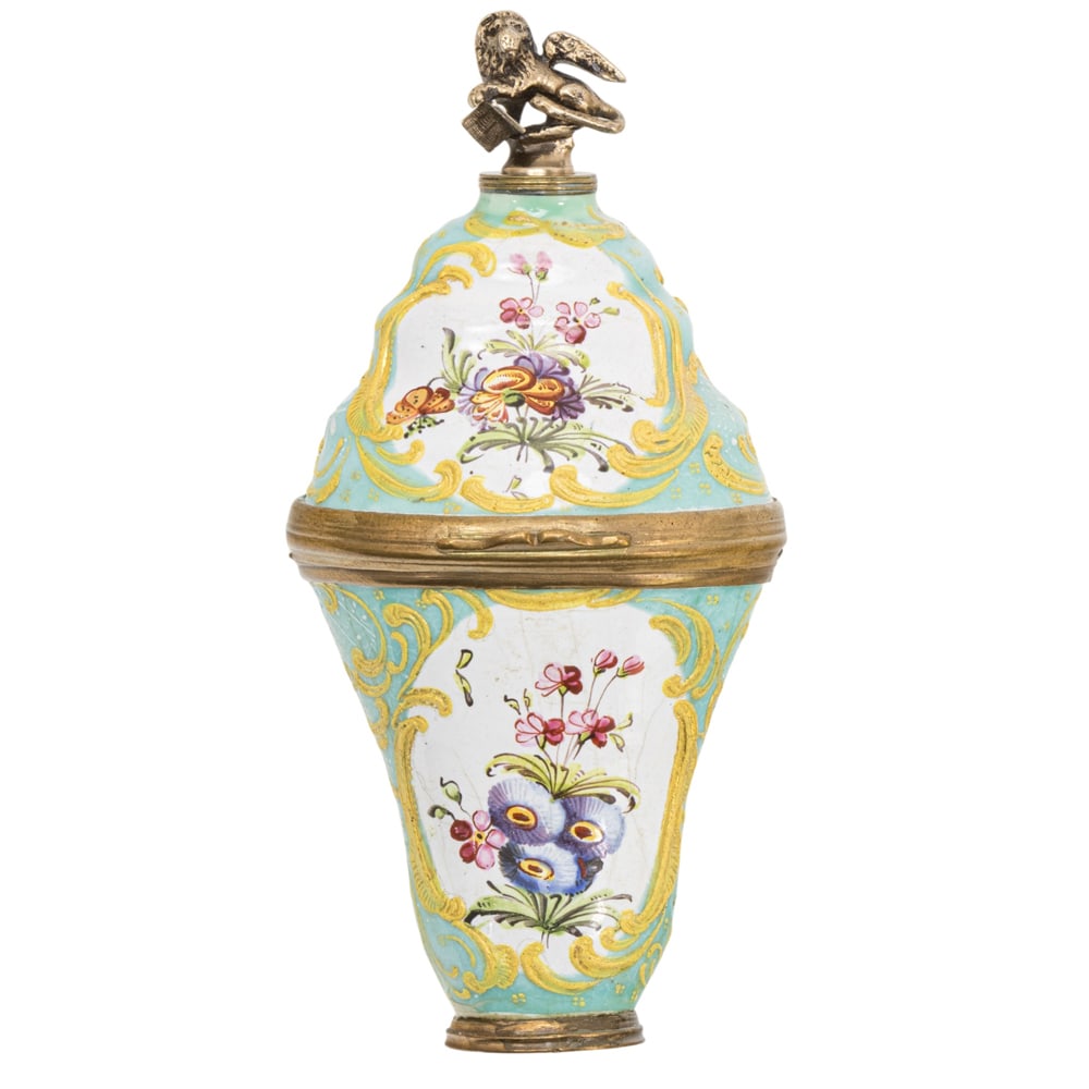 An English enamel combination scent bottle and bonbonniere: An English enamel combination scent bottle and bonbonniere, South Staffordshire, likely second half 18th century, featuring a Lion of St. Mark form stopper above a tapering body decorated with floral