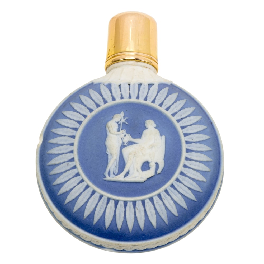 An English jasper porcelain scent bottle with 14k gold cap: An English jasper porcelain scent bottle with 14k gold cap, possibly Wedgwood or Adams, 19th century, of moon flask form decorated with classical figures, 2.5?l. Provenance: The Collection of Irene