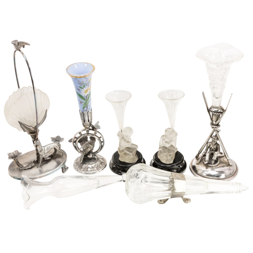 A collection of seven flower holders (1 of 6)