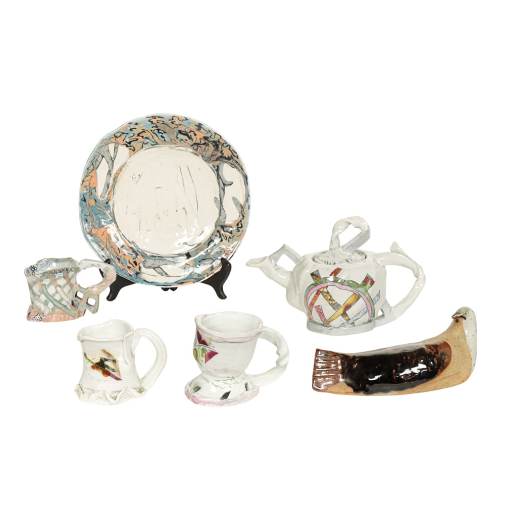 Porcelain Dishes, Juta Savage: (lot of 6) Juta Savage (American, 20th century), Decorated Dishes and Bird, three porcelain teacups, one teapot, one large plate, and one stoneware bird, plate signed beneath, overall (for plate):
