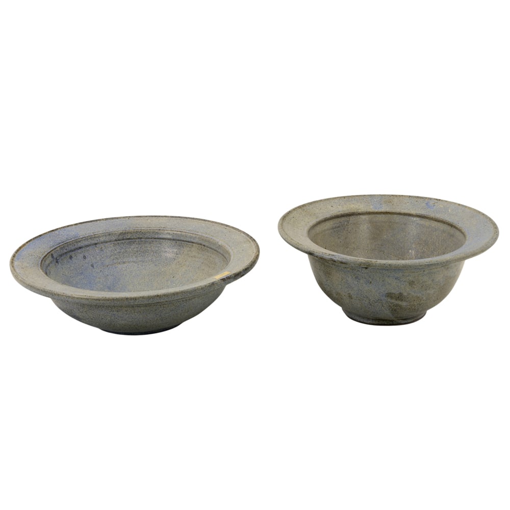 Ceramic Bowls, American School (20th century): (lot of 2) American School (20th century), Blue Bowls, stoneware bowls with wide lips, each unsigned, overall (for larger): 5.5"h x 12.5"w x 12.5"d. Provenance: Property from the Private Collection