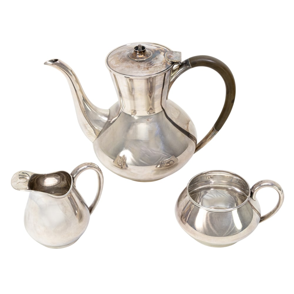A Japanese 950 standard silver three piece tea set (1 of 5)