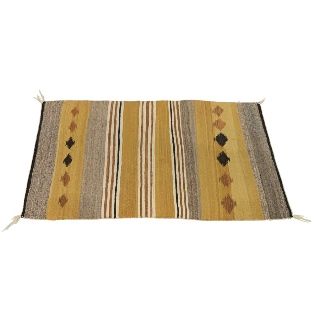 A Navajo carpet: A Navajo carpet, 34" x 57"
