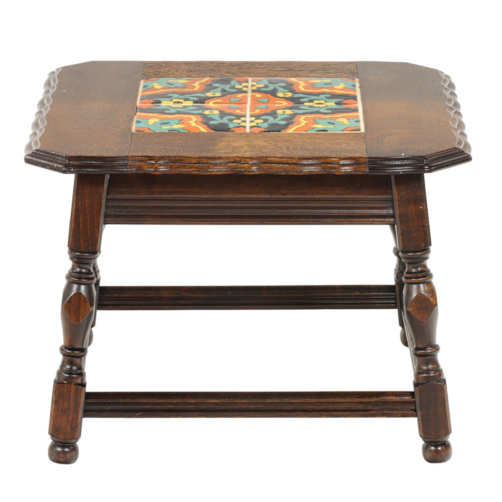 A Taylor tile top table - 2