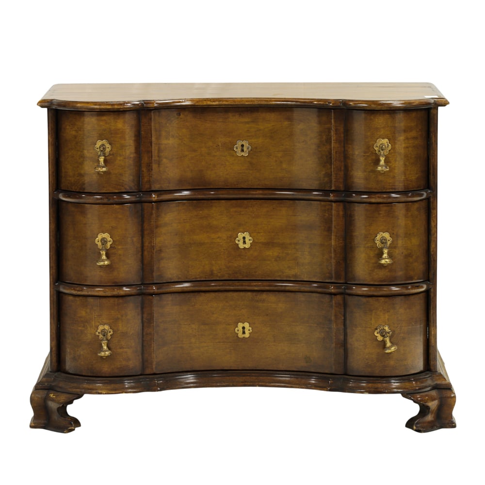 A reverse serpentine commode (1 of 5)