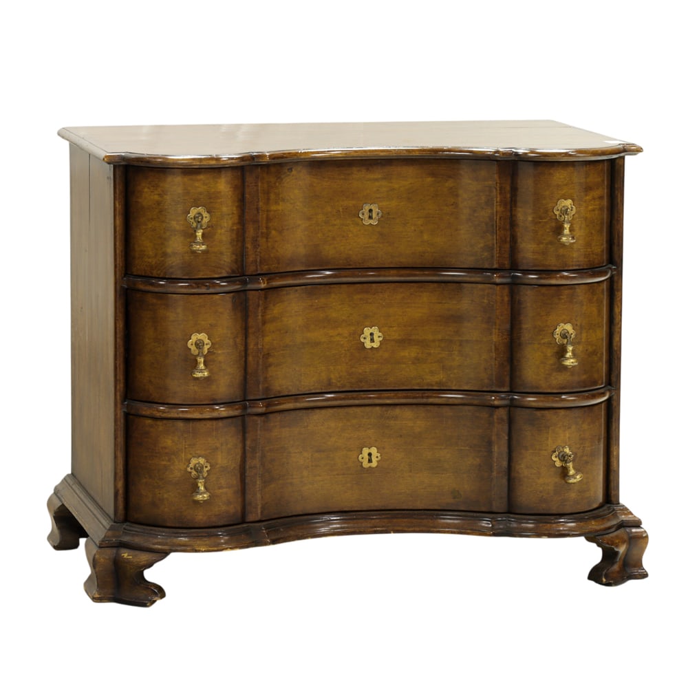 A reverse serpentine commode - 2