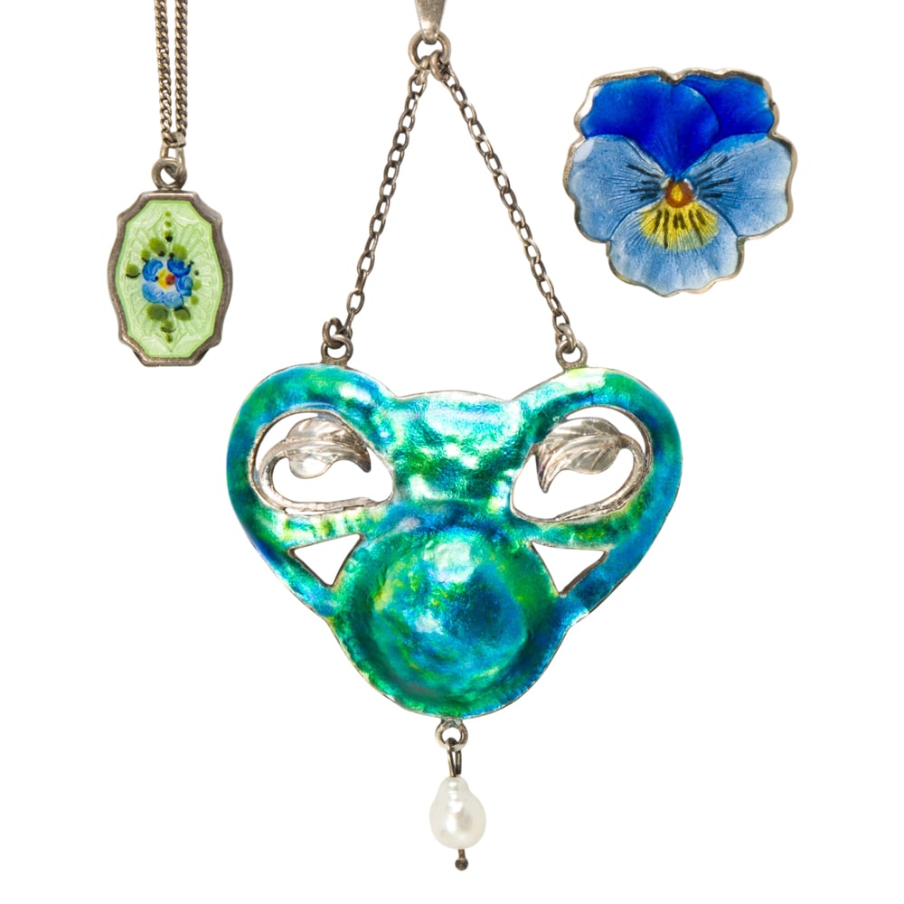 Three pieces of enamel jewelry: Three pieces of enamel jewelry Comprising two necklaces and one pin featuring enameling of varying styles; gross weight: 15.65 grams