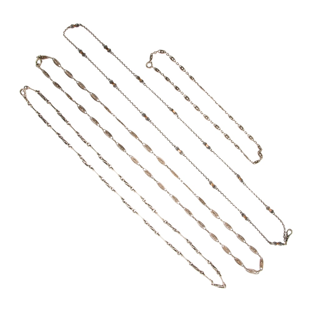 Four silver chains (1 of 1)