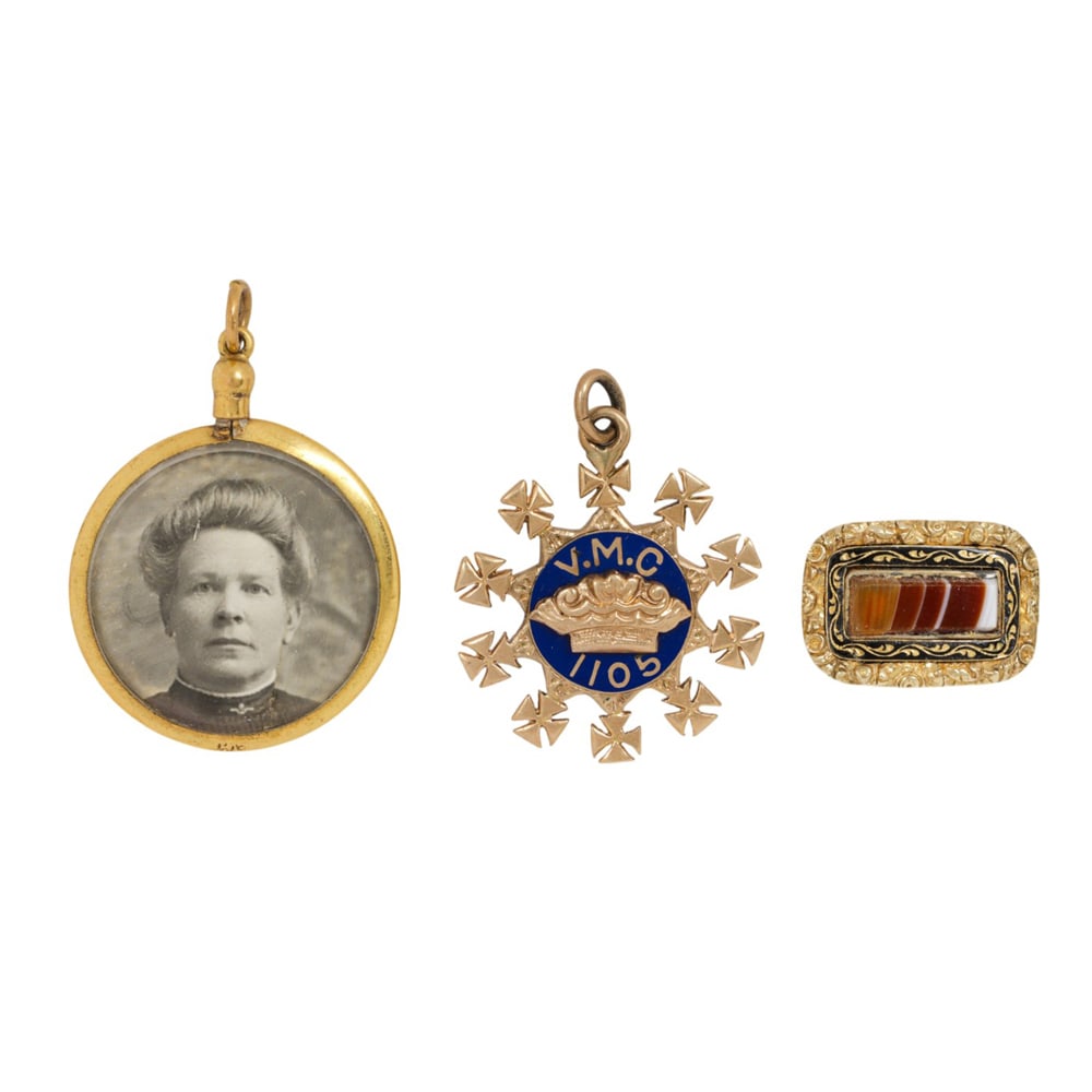 Three pieces of gold and gold-filled antique jewelry: Three pieces of gold and gold-filled antique jewelry Comprising two gold-filled pendants and one 14k gold and agate pin; gross weight: 13.10 grams