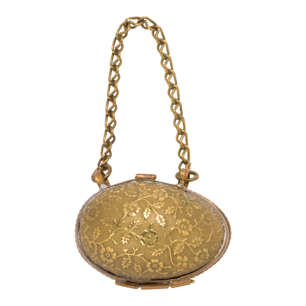 An antique gold-tone egg thimble holder (1 of 1)