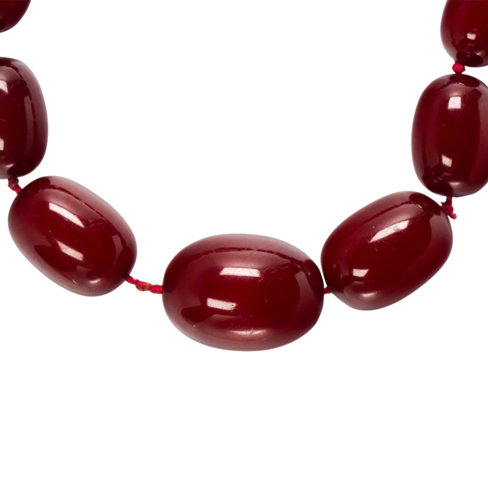A cherry bakelite necklace - 2