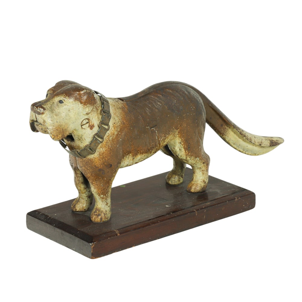 A painted cast iron St. Bernard dog nutcracker: A painted cast iron St. Bernard dog nutcracker, 6"h x 4.5"w x 12"d