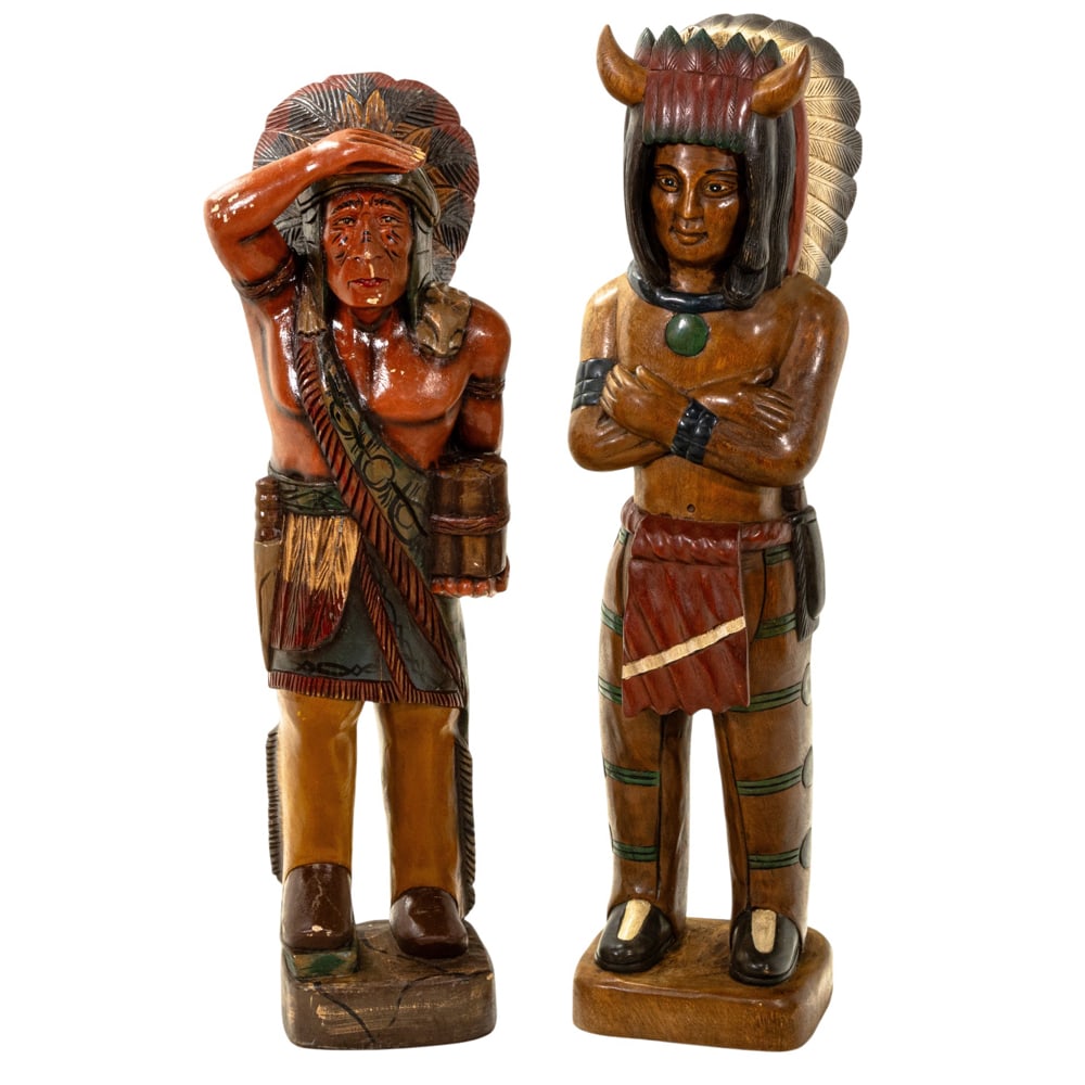 A group of two wood carved and painted tobacco shop figures: A group of two wood carved and painted tobacco shop figures, greatest 41"h x 10"w x 8"d, smallest 38"h x 8"h x 7"d
