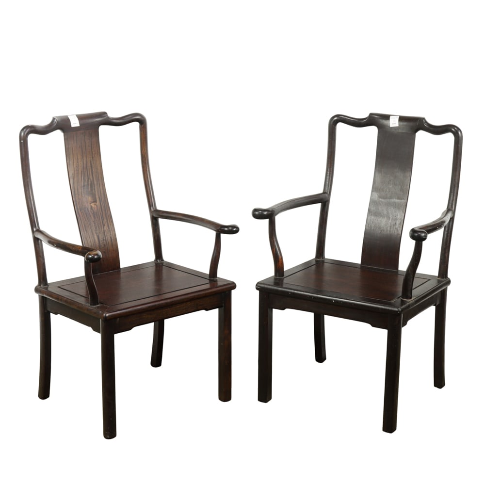 A pair of Chinese hardwood armchairs: A pair of Chinese hardwood armchairs. 20th century, 38"h x 24.625"w x 18"d.