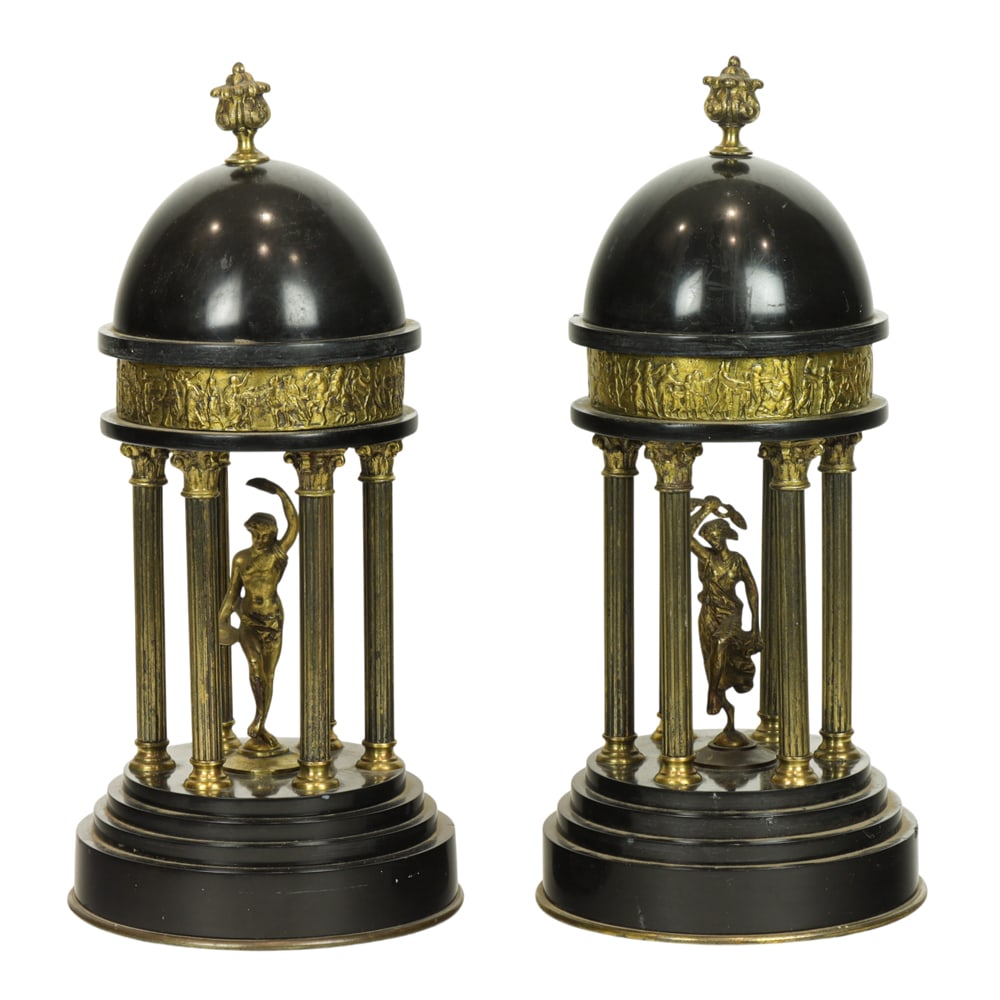 A pair of Grand Tour style gilt bronze and black slate colonnade temple models: A pair of Grand Tour style gilt bronze and black slate colonnade temple models, early 20th century, each architectural folly centering a dancer, 15"h x 7"dia