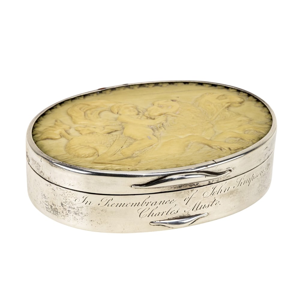 A George III sterling box, Samuel Whitford II, London, 1815: A George III sterling box, Samuel Whitford II, London, 1815, centering a later celluloid relief of a putto riding a hippocampus, inscribed 'In Remembrance of John Simpson, Charles Musto', 1"h x 4"w x 
