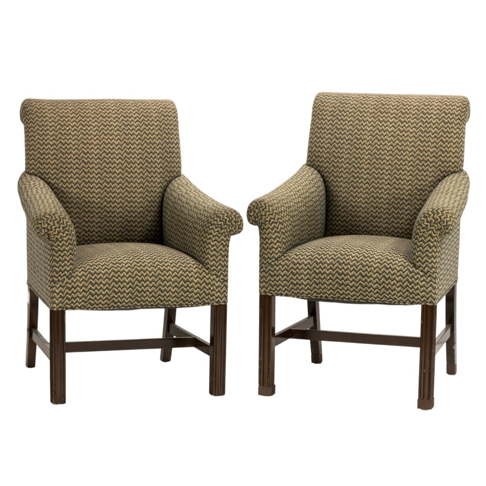 A pair of contemporary club chairs: A pair of contemporary club chairs, each with outswept arms, and rising on square legs 41.5"h x 28"w x 24"d (overall); 21"h x 19"d (seat)