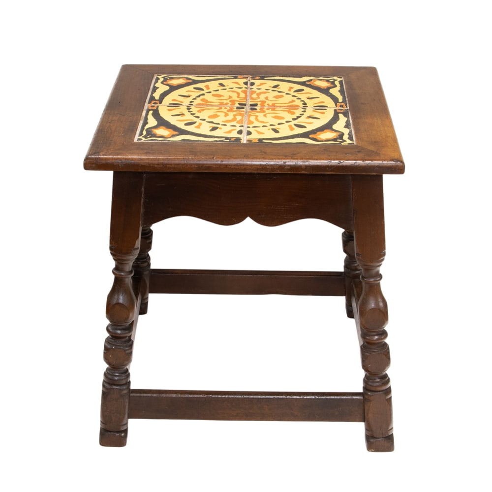 A Spanish Revival Taylor tile top table: A Spanish Revival Taylor tile top table, with splayed baluster turned legs and a box stretcher, 18.5"h x 17"sq
