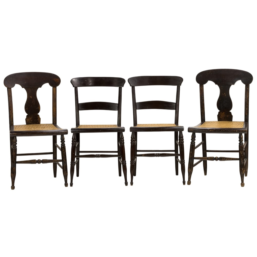 A group of four side chairs second half 19th century: A group of four side chairs second half 19th century, the associated set two having an urn form splat with gilt stringing, and two with ladder back, all with cane seat foundation and rising on turned