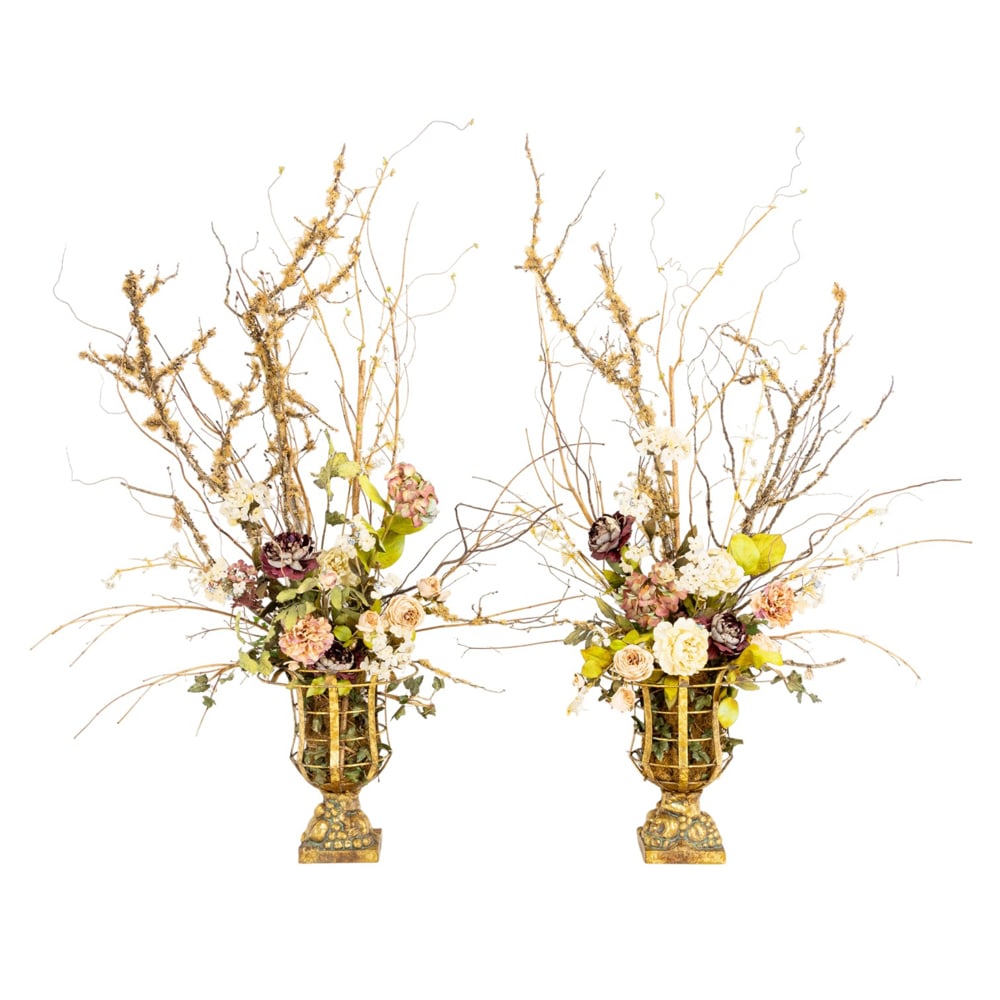 A pair of gilt metal and plaster urns: A pair of gilt metal and plaster urns, each openwork vessel fitted with a custom arrangement of silk flowers, 19"h x 7.5"sq (urns). Provenance: A private collection, Hillsborough, CA