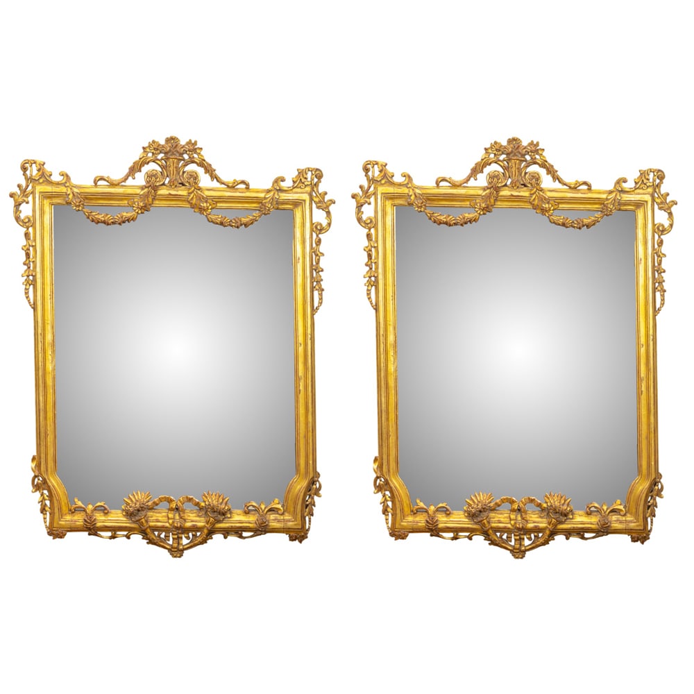A pair of Neoclassical style giltwood mirrors (1 of 8)