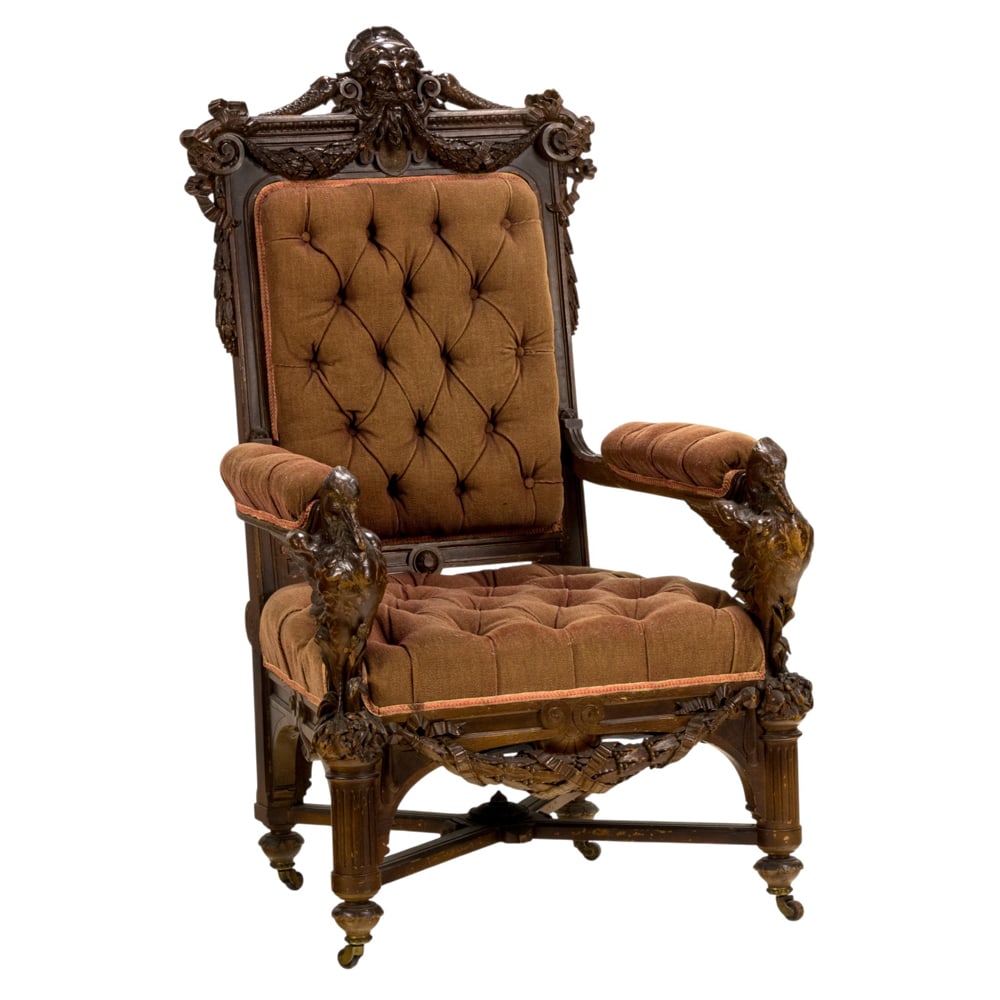 A Herter Brothers American Renaissance carved walnut armchair commissioned for the Billiard Room of: A Herter Brothers American Renaissance carved walnut armchair commissioned for the Billiard Room of the Milton Slocum Latham residence, Thurlow Lodge circa 1872, executed by Herter Brothers, New York,