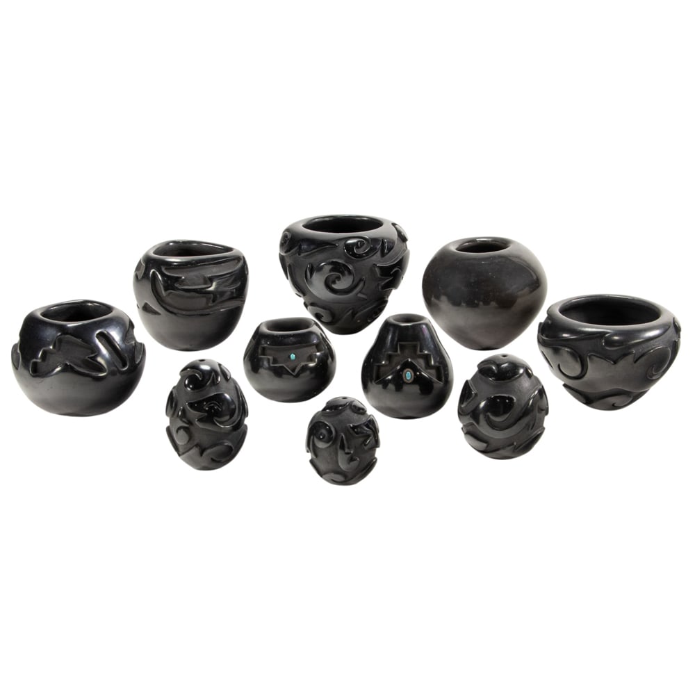 Ten Santa Clara blackware pottery vessels: Ten Santa Clara blackware pottery vessels, comprising (3) seed jars by Victor and Naomi Eckelberry, largest: 3"h; (2) shouldered vessels by Victor and Naomi Eckelberry, largest: 3.5"h x 5"w; (1) vesse