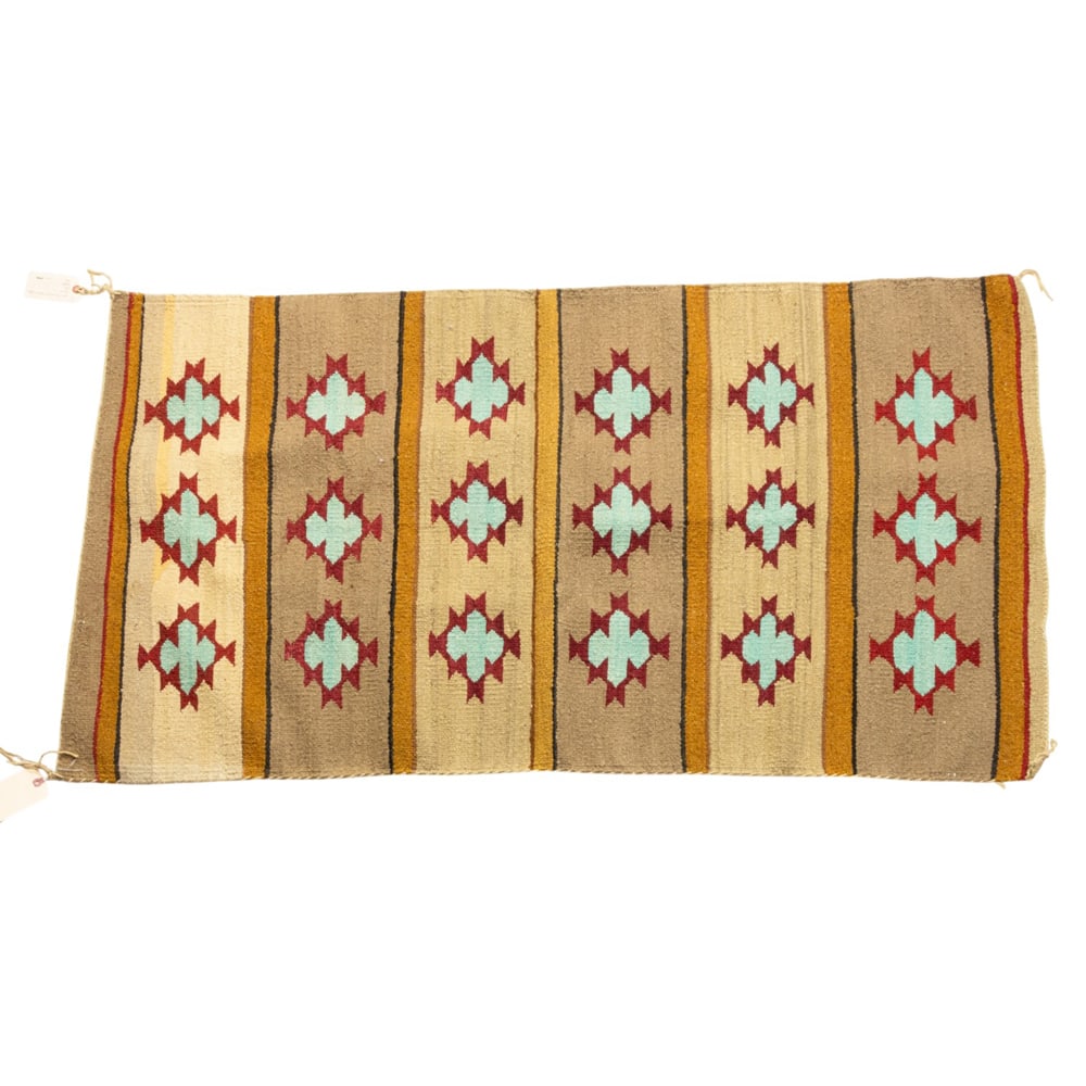A Navajo rug: A Navajo rug, 4'8" x 2'7"