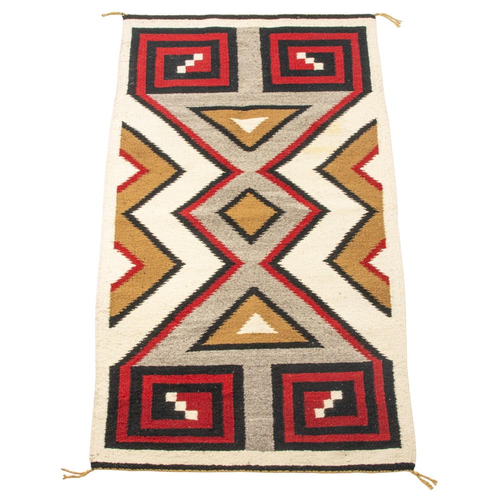 A Navajo rug: A Navajo rug, 4'1" x 2'9"