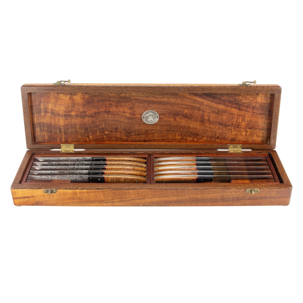 A ten-piece Salter Fine Cutlery steak knife set: A ten-piece Salter Fine Cutlery steak knife set, each knife with signed Japanese damascus blade and inlaid koawood handle, fitted with koawood box, knife 10"l, box 3.5"h x 24"w x 6.5"d