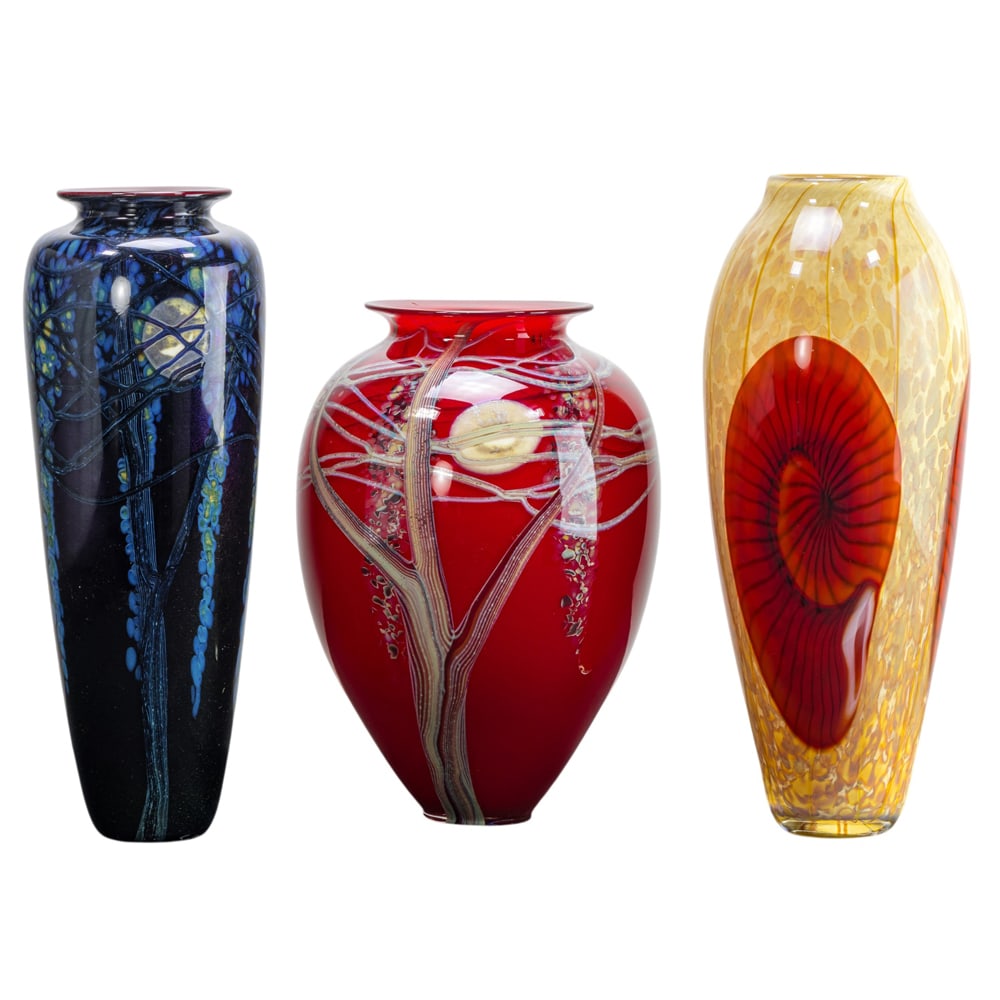 Three Richard Satava glass vases: Three Richard Satava glass vases, dated 1999 and 2005, decorated with wisteria or shells, signed 'Satava 3899-99', 'Satava 1230-05' and 'Satava 3327-99', between 12"h and 14"h