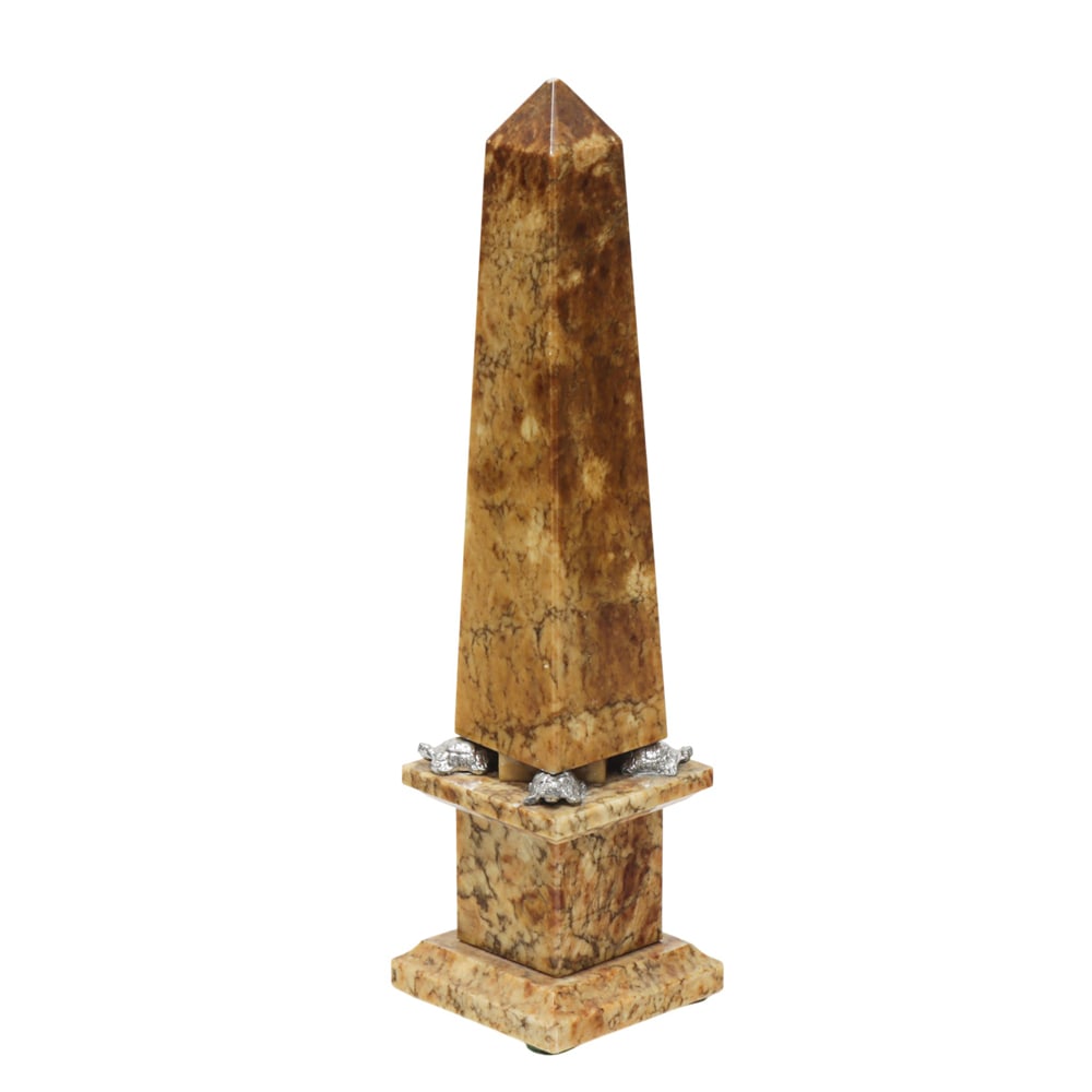 A Neoclassical style stone obelisk: A Neoclassical style stone obelisk, late 20th century, the point raised on the back of turtles and raised on pedestal, 14"h x 3.5"sq. (base)